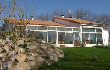 Véranda traditionnelle à pan coupé