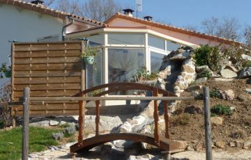 Véranda traditionnelle à pan coupé